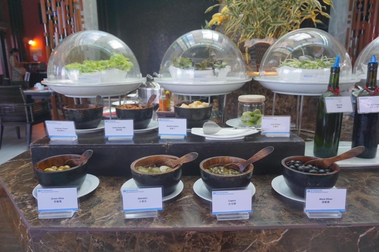 Wyndham Sea Pearl Resort, Phuket Patong Buitenkant foto A selection of garnishes at a buffet