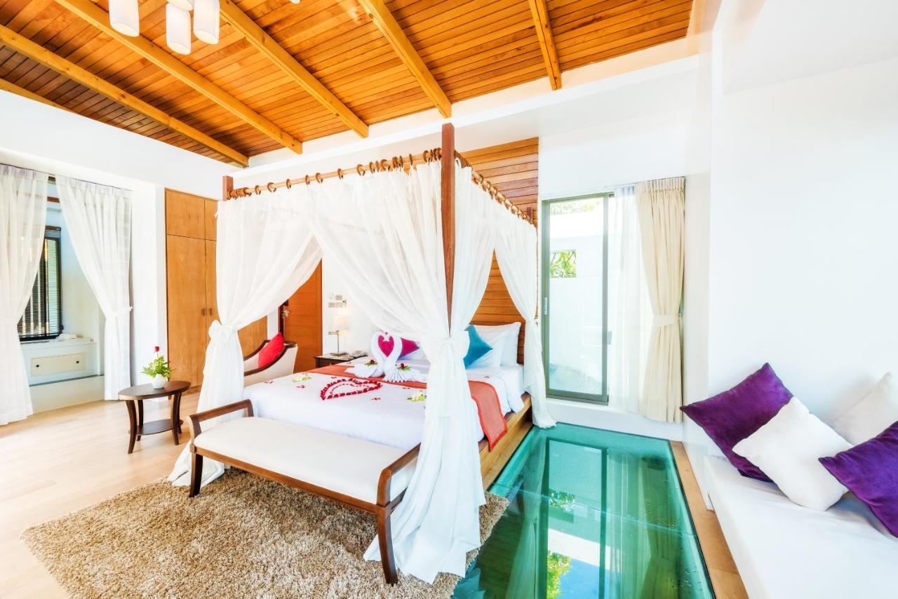Wyndham Sea Pearl Resort, Phuket Patong Buitenkant foto A bedroom at the resort