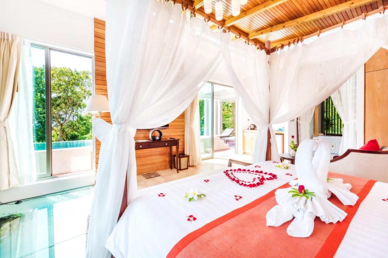 Wyndham Sea Pearl Resort, Phuket Patong Buitenkant foto A bedroom at the resort